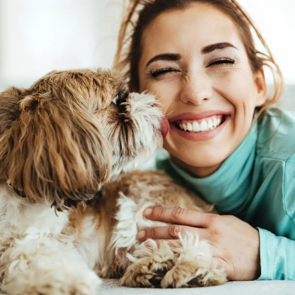 A women very happy with her emotional support animal on the bus after registering with ESA Registry UK