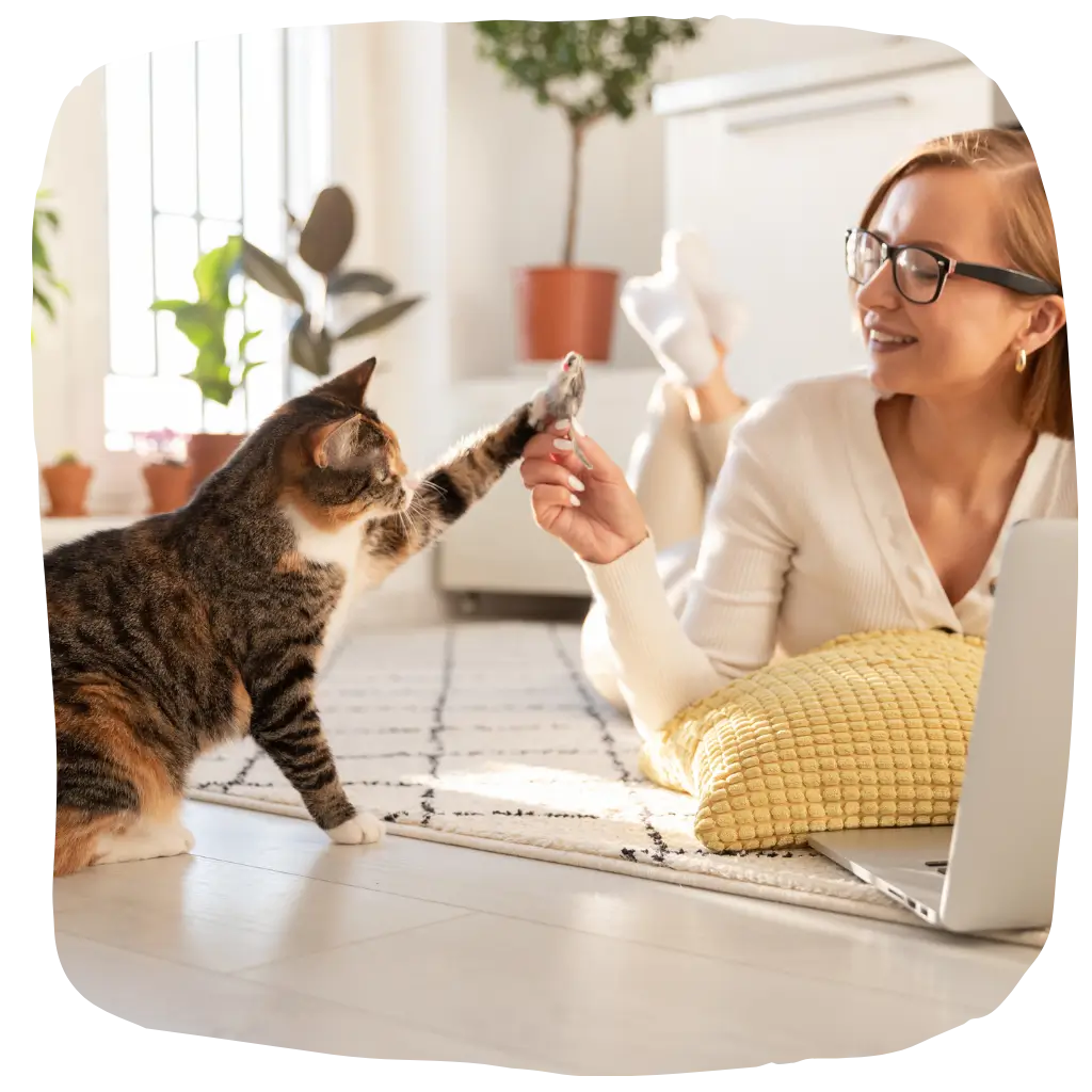 A lady playing with her emotional support animal in the UK. after registering their pet with ESA registry UK
