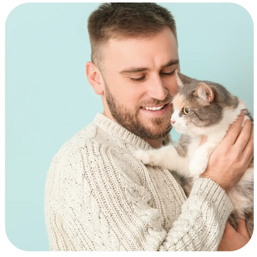 A young man happy with his emotional support animal after registering with ESA Registry UK